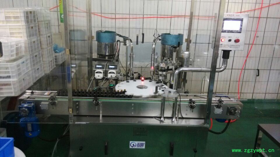 140401全自动精油灌装-下塞-下盖-轧盖一体机